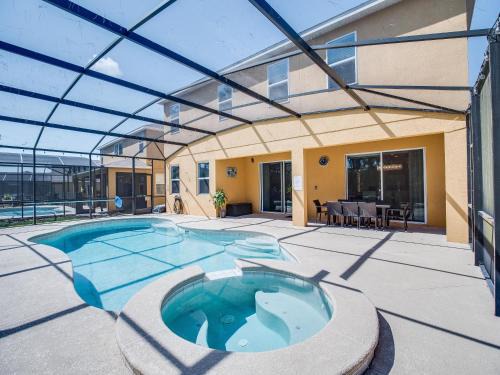 Watersong House | Epic 6-Bedroom Escape - Private Theater, Game Room, Pool, Spa & Themed Fun in Resort-Style Comfort