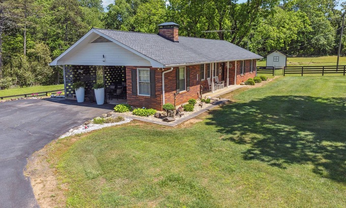 Tate House | Escape to RJ Acres to unwind and relax on 3 acres of privacy.