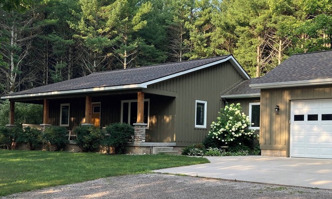 Traverse City House | Evergreen Cottage in Lake Ann