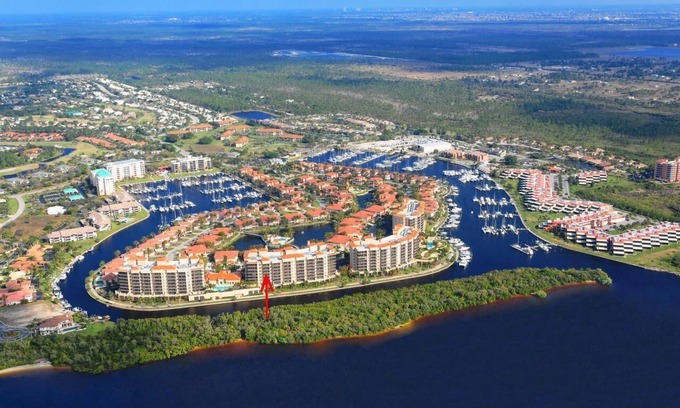 Burnt Store Marina Condo | Experience Gulf Front Coastal Living @ Grande Isle III on Prosperity Point