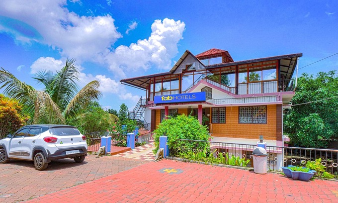 Madikeri Hotel | Fabexpress Misty Green