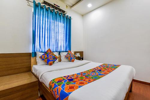 Prahlad Nagar Hotel | FabExpress Relax Inn - Nr Sarkhej - Gandhinagar Highway