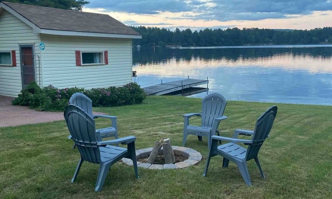 Combermere House | Family beach front with flat shoreline for swimming and water front living space