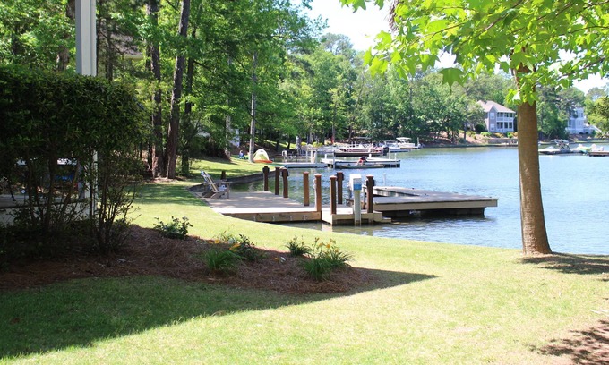 The Woods of Longleaf House | Family home on beautiful Lake Martin in a quiet cove. Great location!