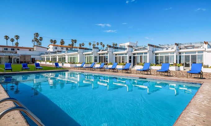 La Paloma House | Fantastic dog-friendly home with heated pool, hot tub, partial ocean view, patio