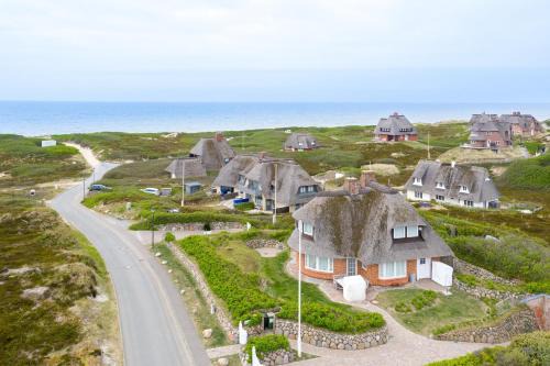 Rantum House | Ferienhaus Seehaus Sylt - Urlaubszauber in den Dünen mit fantastischem Meerblick