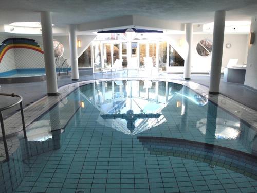 Dorumer Neufeld Apartment | Ferienwohnung dat Stürboord mit Schwimmbad und Sauna