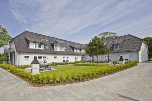 Gross Zicker Apartment | Ferienwohnung mit Meerblick und Gartennutzung - Haus Inselwind FeWo MEERsicht
