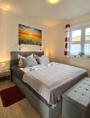 Luetow Apartment | Fewo Mohnblume Lütow Usedom Achterwasser rotes Haus