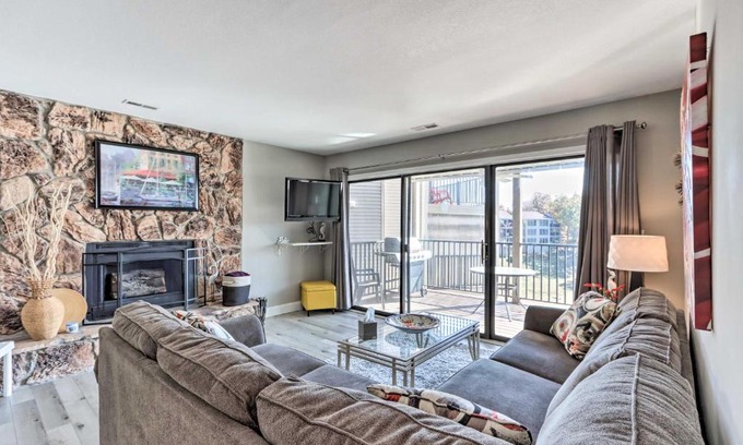 Lake Ozark Apartment | Fireplace and Grill Bright Lake Ozark Condo!
