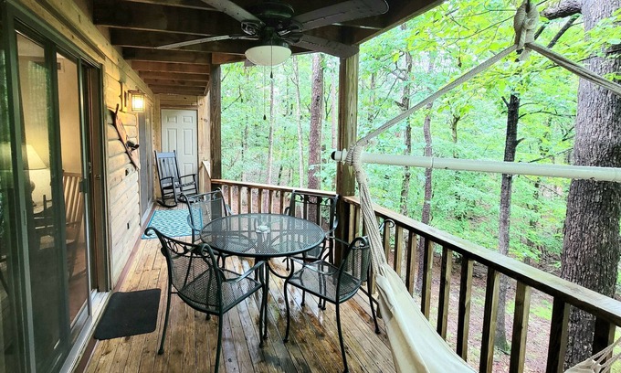 Mount Ida Condo | Forest view, log-sided two bedroom, two bath condo on Lake Ouachita. 2 Condo by RedAwning