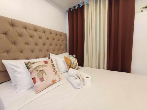 South Triangle Apartment | Frabeca Staycation at Mplace Condo QC