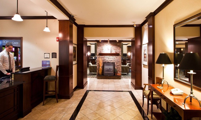 Okemos Condo | Free Breakfast Buffet. Near Michigan State University.