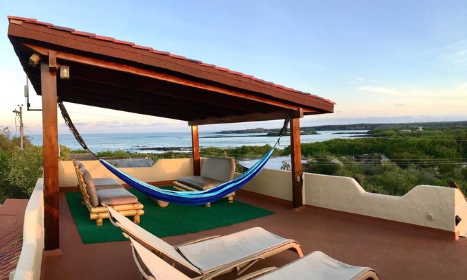 Puerto Ayora House | Galapagos Shangri-La pool footsteps to the beach