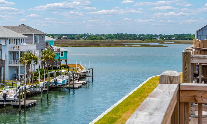 Topsail Beach House | Gemini Dream #102 - Soundfront w/Pool, Boat Dock, Elevator, Dogs Allowed!