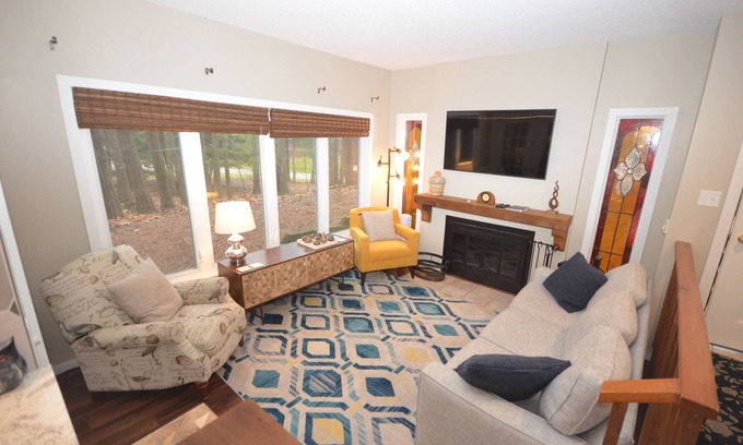 Maple City House | Glen Arbor condo in the woods w/screened porch, A/C, washer/dryer