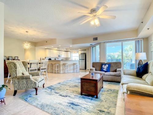 New Smyrna Beach Apartment | Gorgeous Ocean Walk Corner Unit with Water Views OW15-207