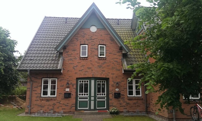 Wyk auf Foehr Apartment | Green Eilun 13 - Modernes Reihenhaus mit Garten, Spielecke, Waldzugang und Nähe zum Südstrand