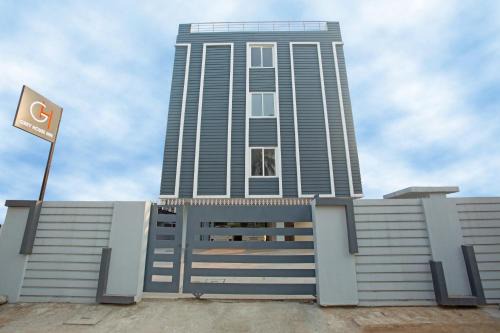 Beltola Hotel | Grey House Inn