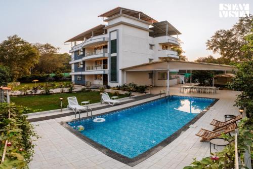 Karjat Villa | Grey Hues with Swimming Pool & Lawn at Karjat by StayVista