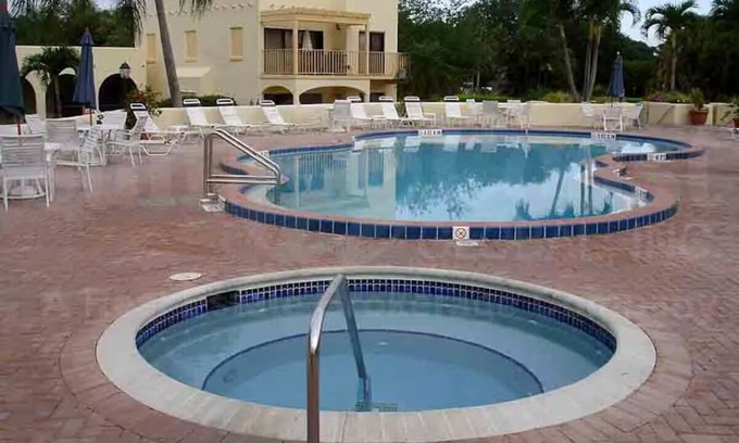 Central Naples Condo | Ground Floor Condo in the Prestigious World Tennis Club, Membership Included