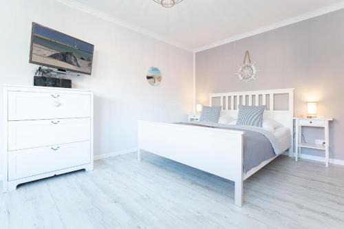 Bosau Apartment | Haus Schwanensee Maritimes Ferienappartement am Plöner See
