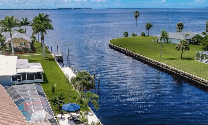 Edgewater House | HEATED POOL WATERFRONT GULF ACCESS 4BR 3.5BA LUXURY FLORIDA HOME NEAR BEACH 🐬n