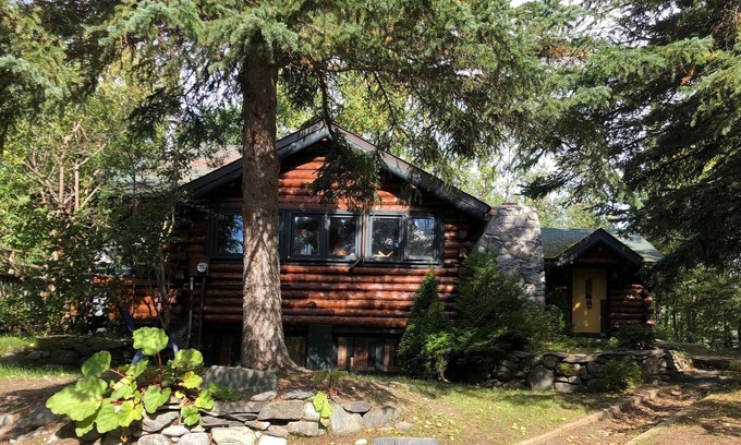 Mid-Hillside House | Historic Log Home in Upscale, Wooded Neighborhood