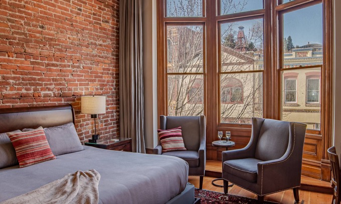 Port Townsend Apartment | Historic Town View Room with bay window overlooking Water Street