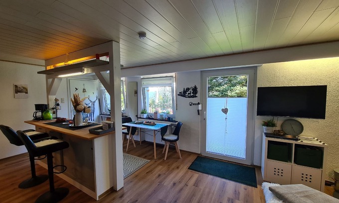 Berlar Apartment | Holiday Apartment Gartenblick 50sqm with Terrace, Garden, Fireplace and Open Kitchen with Counter