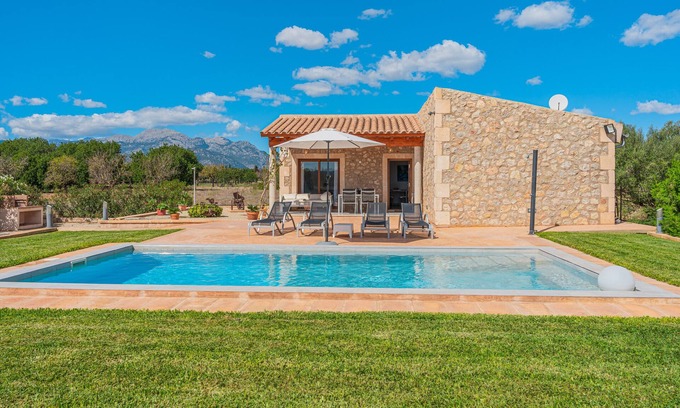Buger Villa | Holiday Home “El Rafal de Son Alberti” with Mountain View, Air Conditioning and Pool