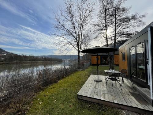 Riedenburg House | Holiday Home Tiny Haus Flussblick by Interhome