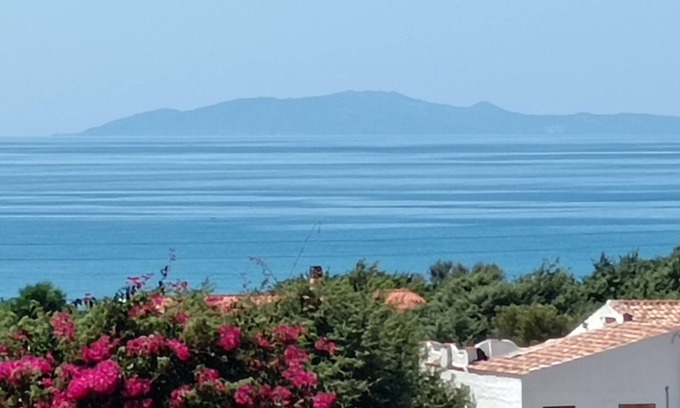 Eden Beach House | Holiday Home 'Villa Marina' with Sea View, Private Terrace and Air Conditioning