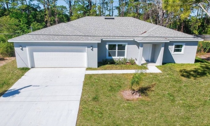 Port Malabar House | Home with Pool Table: Nature, Tranquility, close the Beach, Lake, USSSA.