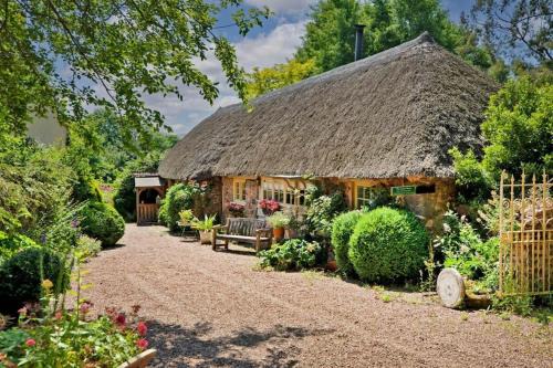 Fiddington House | Idyllic English Thatched Cottage - The Coach House