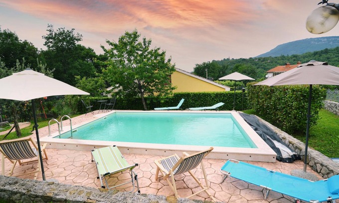 Rim House | Inviting vacation home with pool and traditional flair.