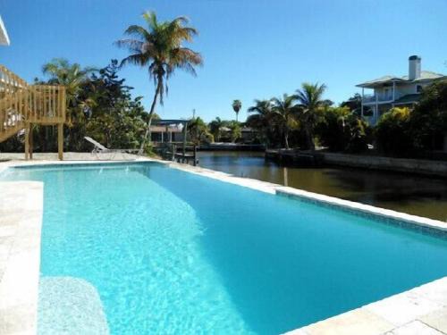 Fort Myers Beach Villa | Island Villa with 33 Foot Infinity Pool, Dolphin Visits