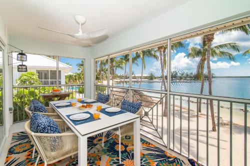 Rum Point Apartment | Kailua - Modern Waterfront Condo with Shared Pool and Hot Tub, Short Walk to the Kaibo