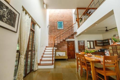 Bengaluru House | Kerala Style Villa by JadeCapsAC4BHKFishpond