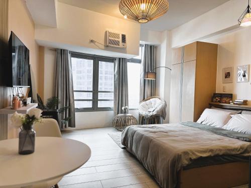 Bagumbayan Apartment | Kozy Mood Studio - 19N Renoir