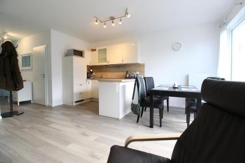 Juliusruh Apartment | Kurparkcarree - Ferienwohnung Meeresbrise