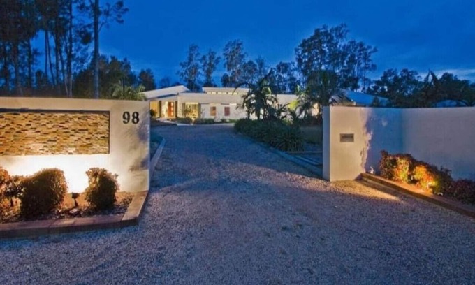 Dora Creek Villa | Lake Palm Retreat - shared pool and waterfront