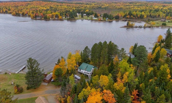 Greenville House | Lakefront cabin with private boat ramp, lake access, wrap-around porch, firepit