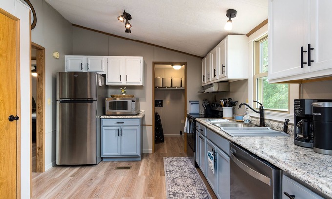 Piney Flats House | Lakefront home, peaceful setting, beautiful views of the lake and floating dock.