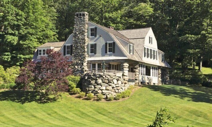 New Preston House | Lakefront Home set on five acres of land, deck, patio, lounge seating by...
