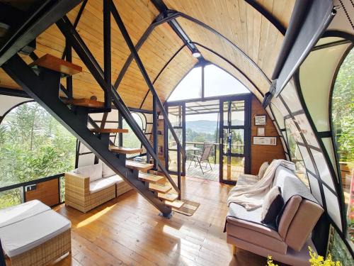 Guarne House | Lakeside Glamping with View Fire Pit Hammock