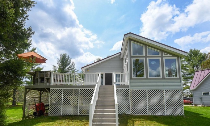 Oxford House | Lakeside Home with 450 feet of Private waterfront on Thompson Lake