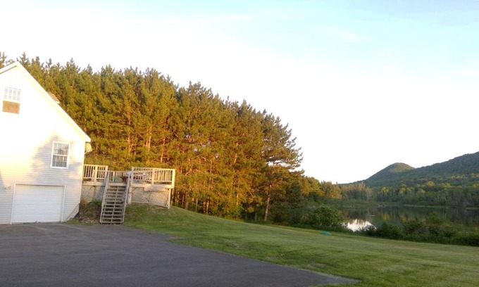 Presque Isle Apartment | Lakeside Snowmobile - Ski Villa, 4BR 2BA, sleeps 10