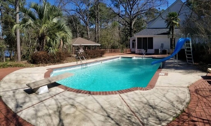 Hattiesburg House | Lakeside with a pool, zip line, horse shoe pit, kayaks. Large gathering spaces