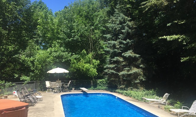 Macatawa House | Large family home with private POOL and hot tub on heavily wooded lot